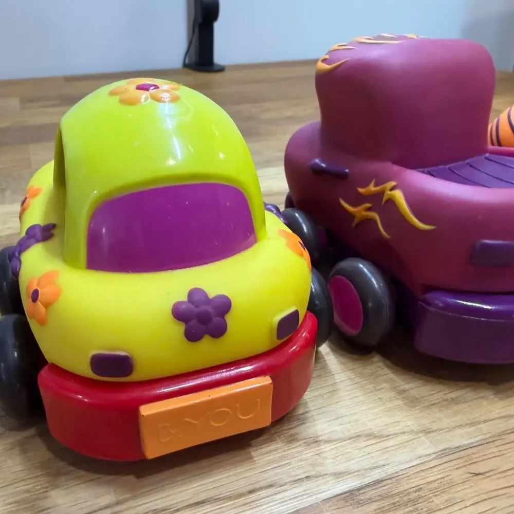 B. Toys Pull Back Trucks Taxi Cab Convertible Lot of 4 Flower Car Play Imaginati
